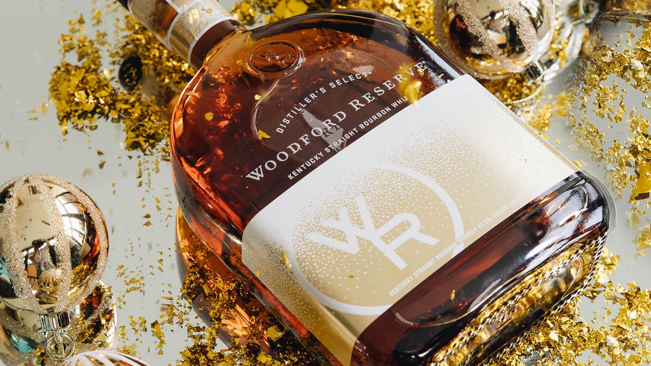 This year’s holiday bottle features a glossy gold foil to complement the rich color of bourbon. (Woodford Reserve)