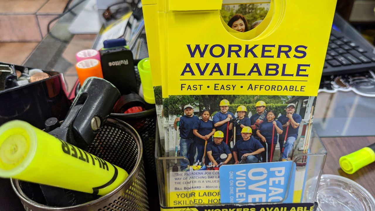 A flier reads "Workers Available" at the Pasadena Community Job Center in Pasadena, Calif., Thursday, May 7, 2020, during the coronavirus pandemic. The job center is now closed to the public but normally connects members of the community, residential customers and small business owners with skilled, hardworking day laborers. (AP Photo/Damian Dovarganes)