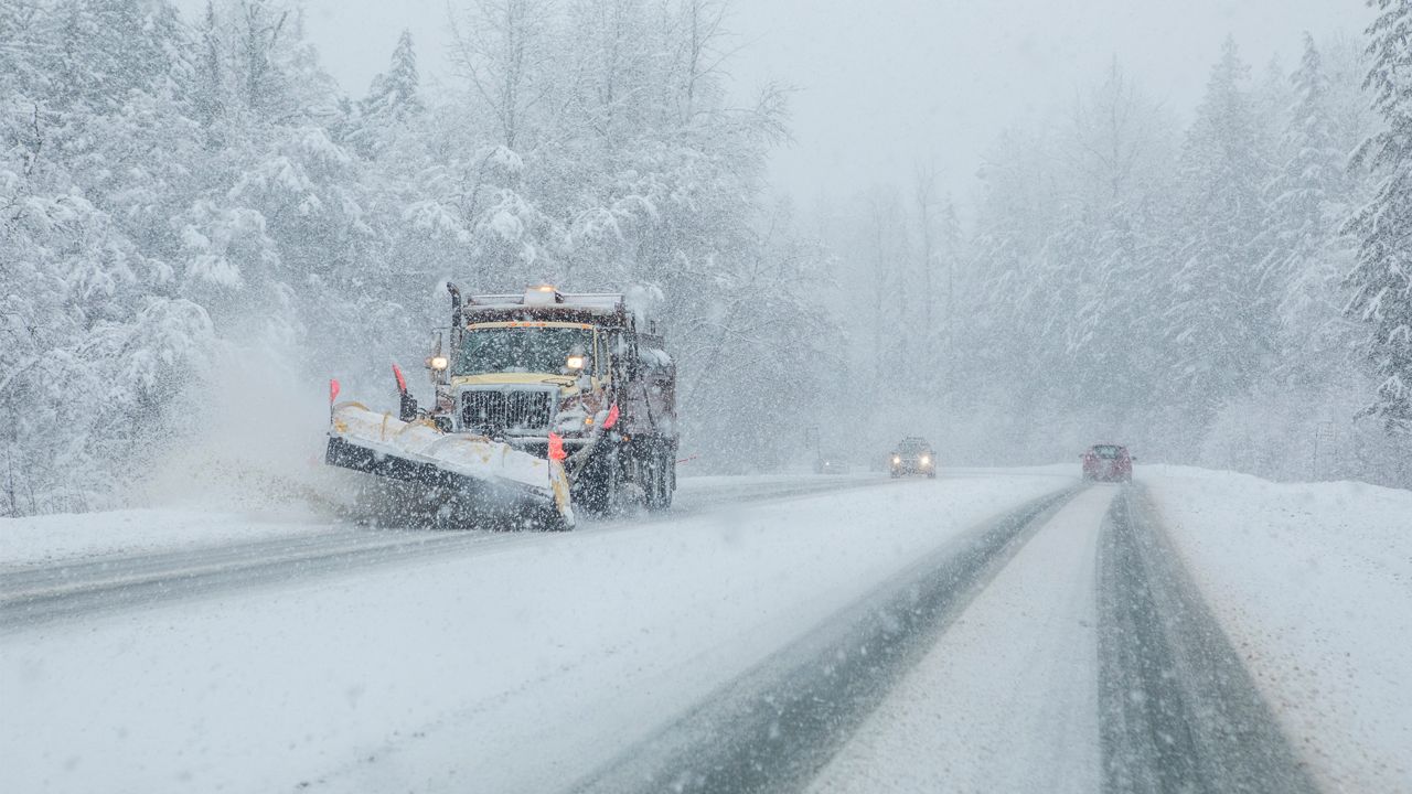 plow in snow storm