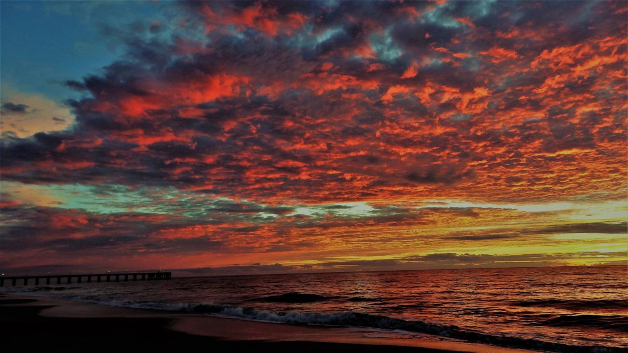 A recent sunrise at Wrightsville Beach.  Photo by Chantal Jonas.