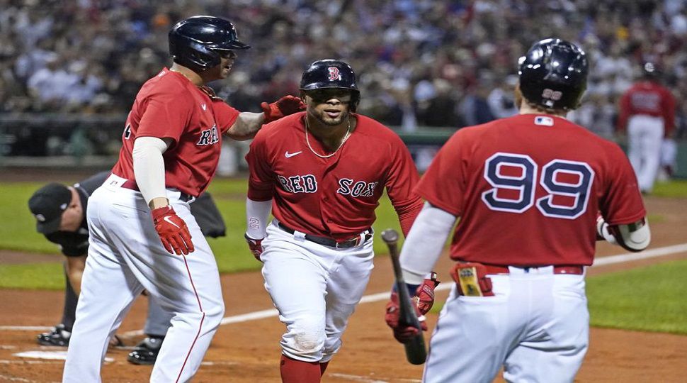 Boston Red Sox third baseman Rafael Devers celebrates his solo HR