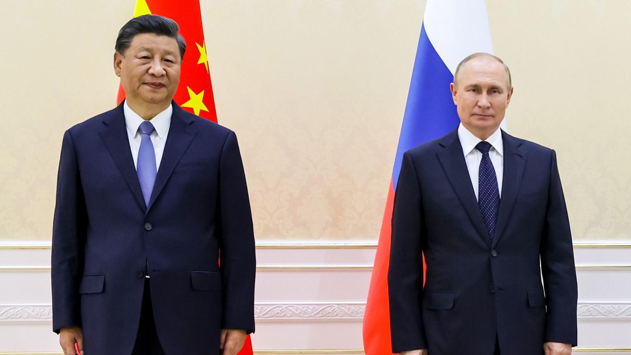 Chinese President Xi Jinping, left, and Russian President Vladimir Putin pose Thursday for a photo on the sidelines of the Shanghai Cooperation Organization summit in Samarkand, Uzbekistan. (Alexandr Demyanchuk, Sputnik, Kremlin Pool Photo via AP)