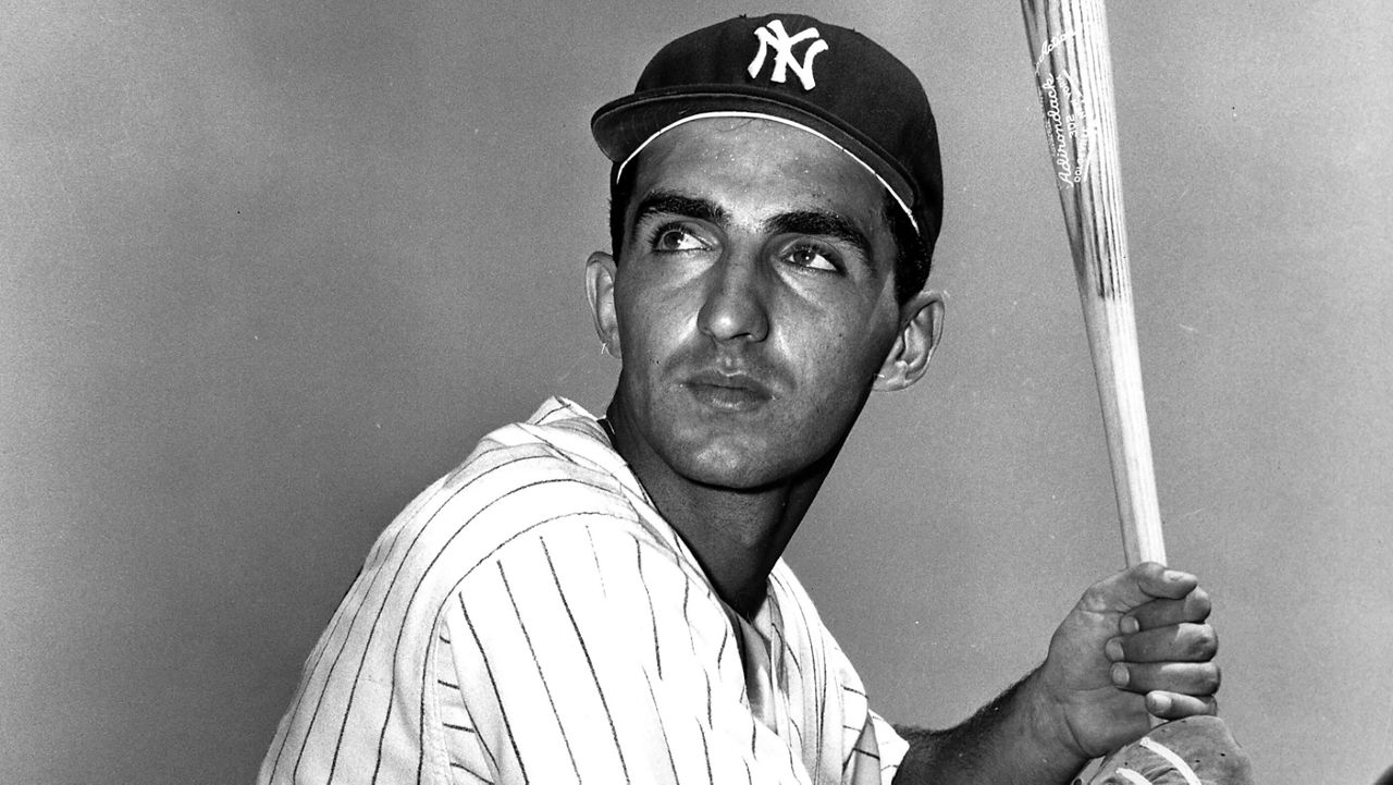 New York Yankees' Joe Pepitone holds a baseball bat in New York, March 10, 1962. Pepitone, a key figure on the 1960s Yankees who gained reknown for his flamboyant personality, has died at age 82. He was living with his daughter Cara Pepitone at her house in Kansas City, Mo., and was found dead Monday, March 13, 2023, according to BJ Pepitone, a son of the former player. (AP Photo/File)