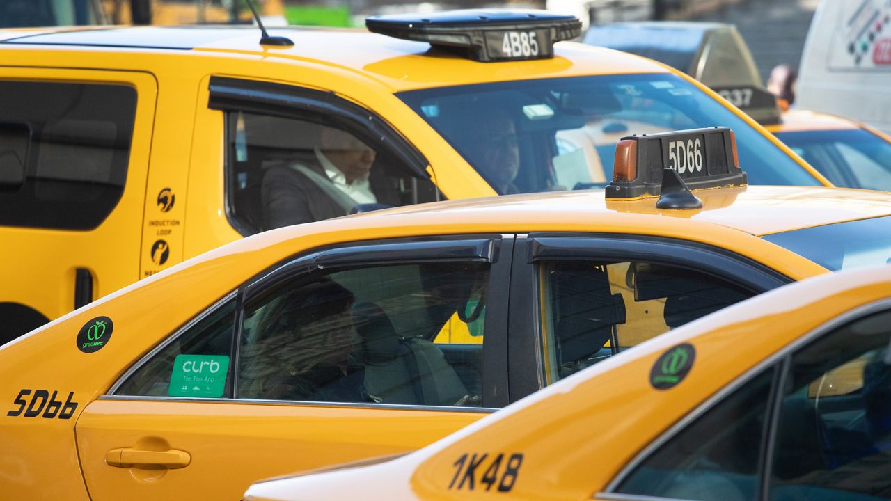 Taxis are lined up in traffic on Wednesday, Jan. 29, 2020 in New York.