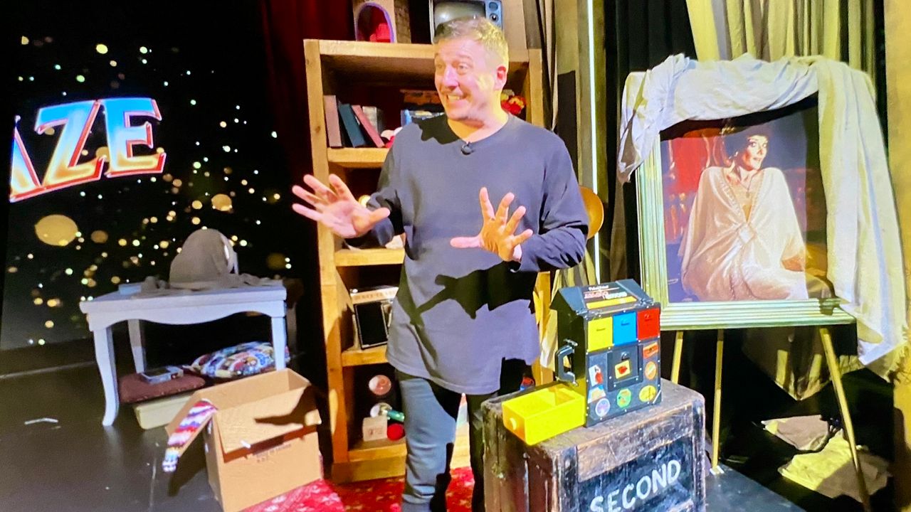 On the set of Amaze at the Straz Center with magician Jamie Allan. (Spectrum News/Bobby Collins)