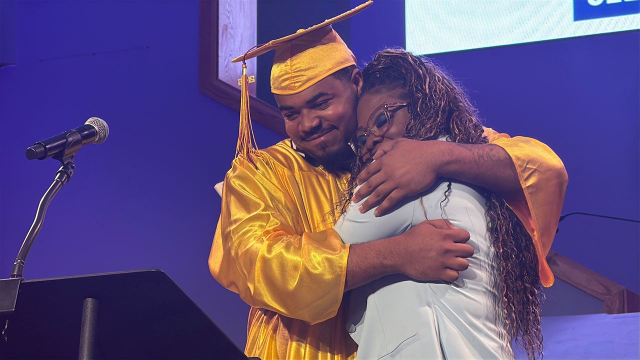 Second chances on stage: YouthBuild Louisville graduates 26 students