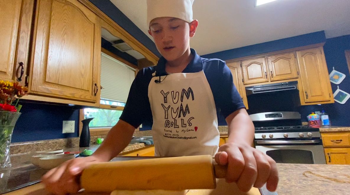 Aaron rolls out a fresh batch of yum yum rolls.