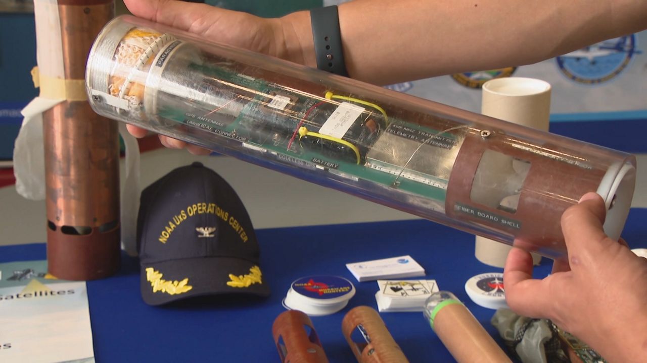 Remote-controlled devices called dropsondes have been used to collect data from inside hurricanes for decades. (Zach Covey/Spectrum News)