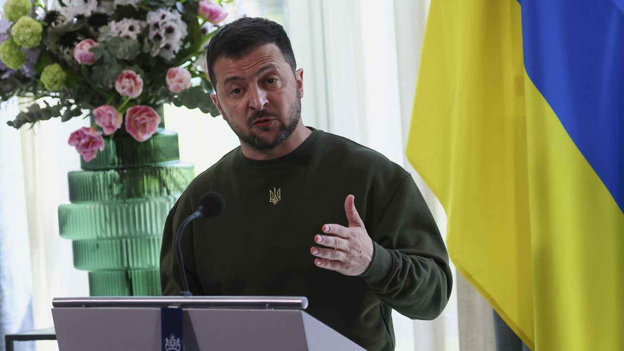 Ukrainian President Volodymyr Zelenskyy speaks Thursday during a joint news conference with Dutch Prime Minister Mark Rutte and Belgian Prime Minister Alexander De Croo in the Hague, Netherlands. (Yves Herman/Pool via AP)