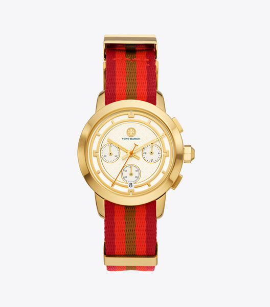  Our Tory chronograph watch is a classic, sporty style. A striped grosgrain band on a polished gold-tone stainless steel case wit