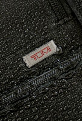 Tumi logo on bag