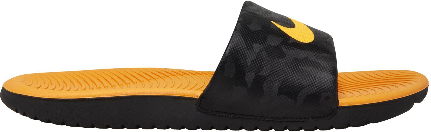 black and yellow nike slides