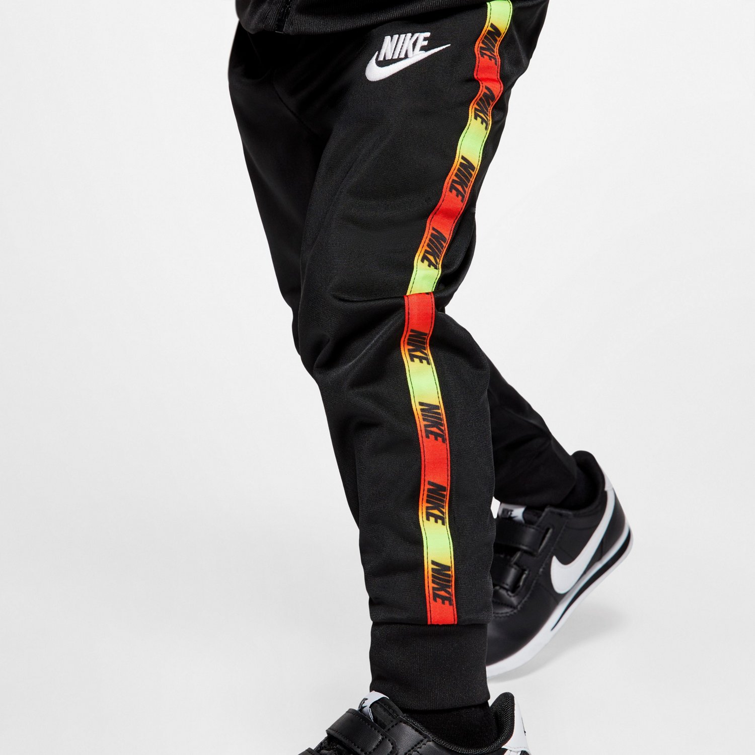 nike repeat pack logo taping polyknit tracksuit in black