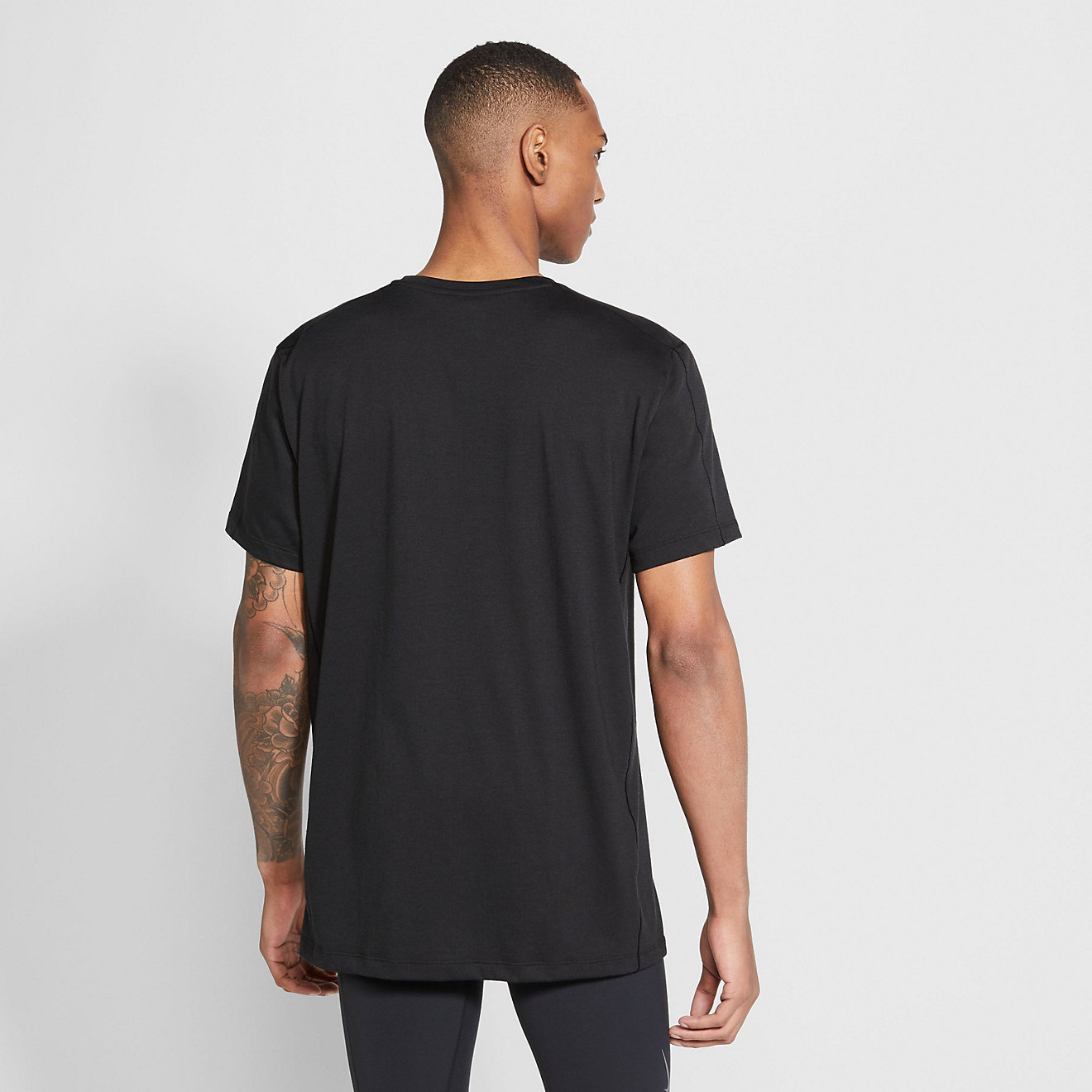 Nike Menâs Pro Dri-FIT Core Yoga Short Sleeve Shirt | Academy