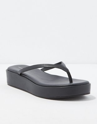 black leather flip flops