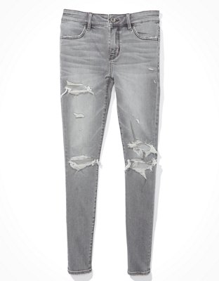 grey jeans with holes