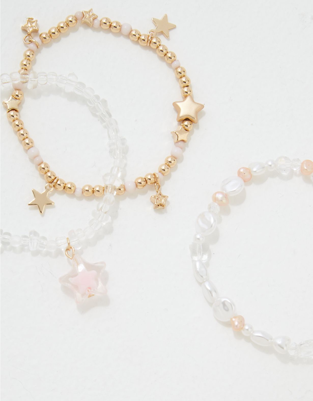 Emballage de trois bracelets en résine à perles et étoiles AEO