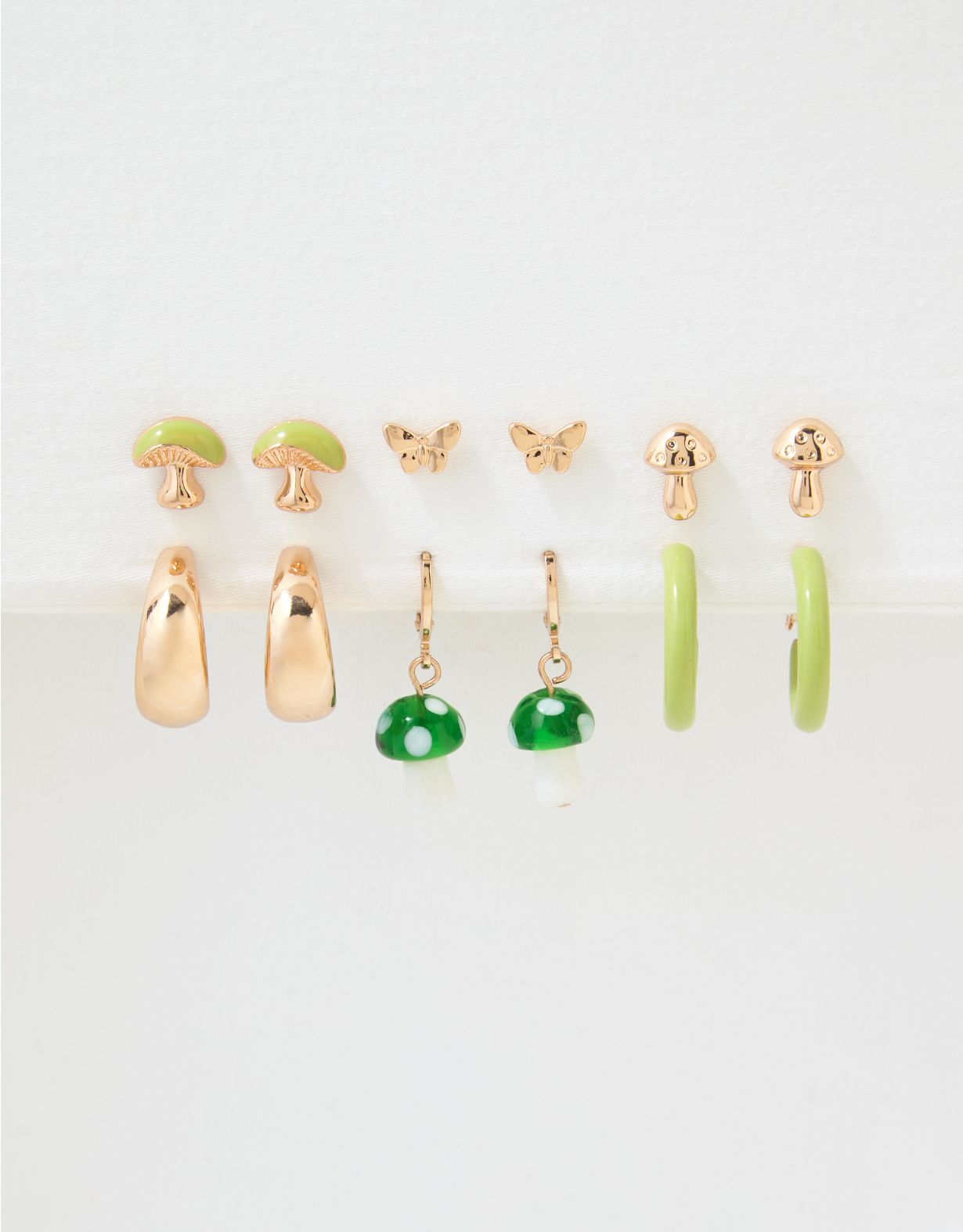 Emballage de six paires de boucles d’oreilles champignon vert AEO