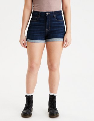 denim shorts with pockets hanging out