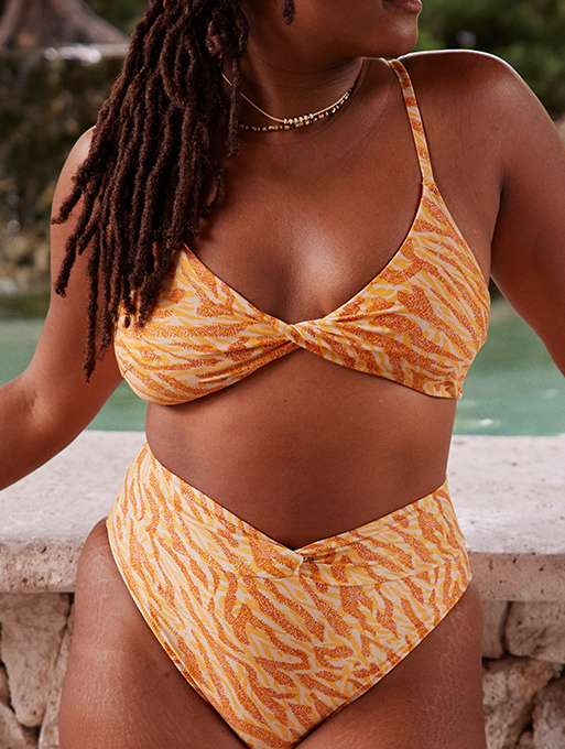 woman in orange animal print bikini