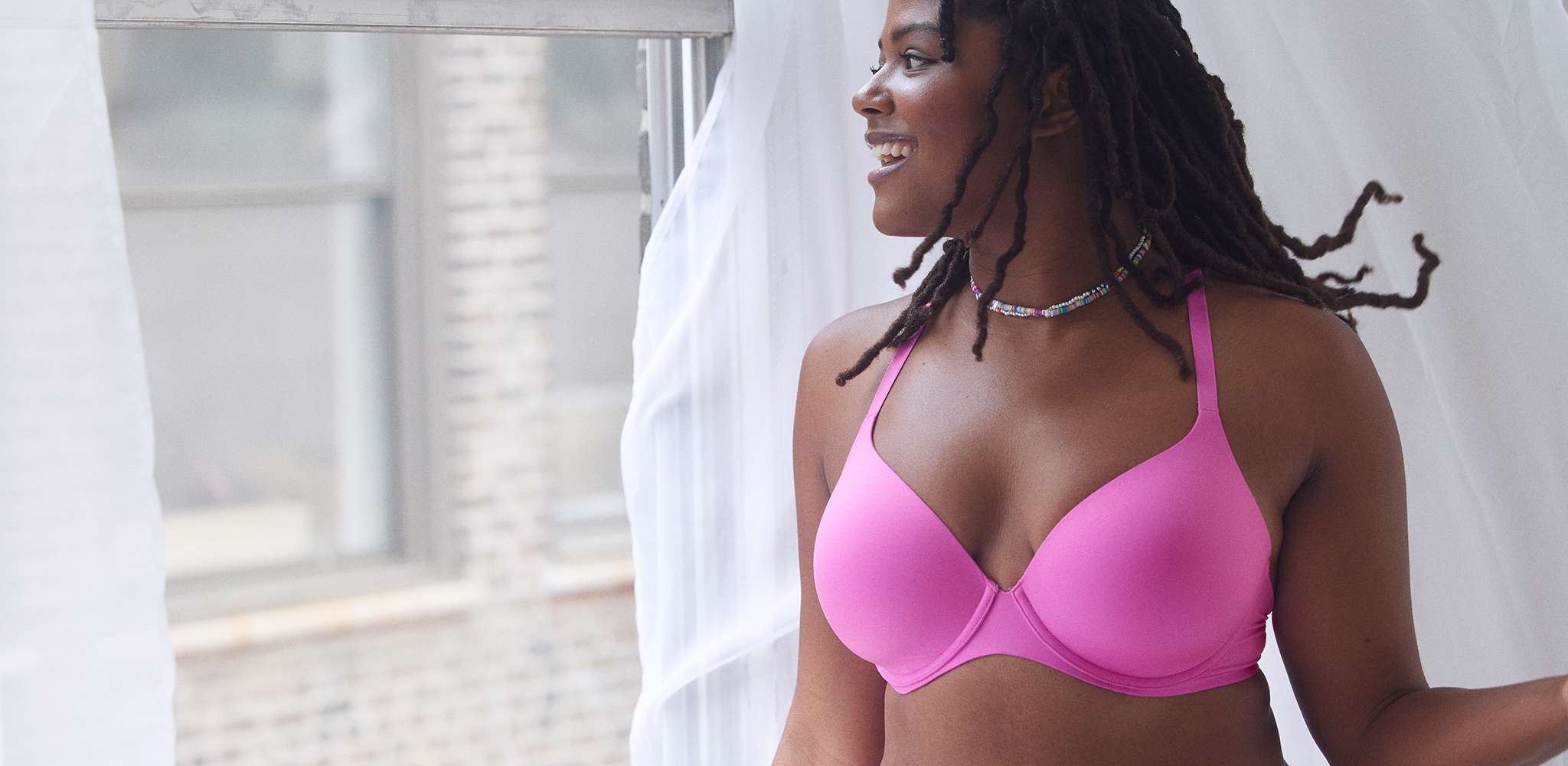model in pink bra