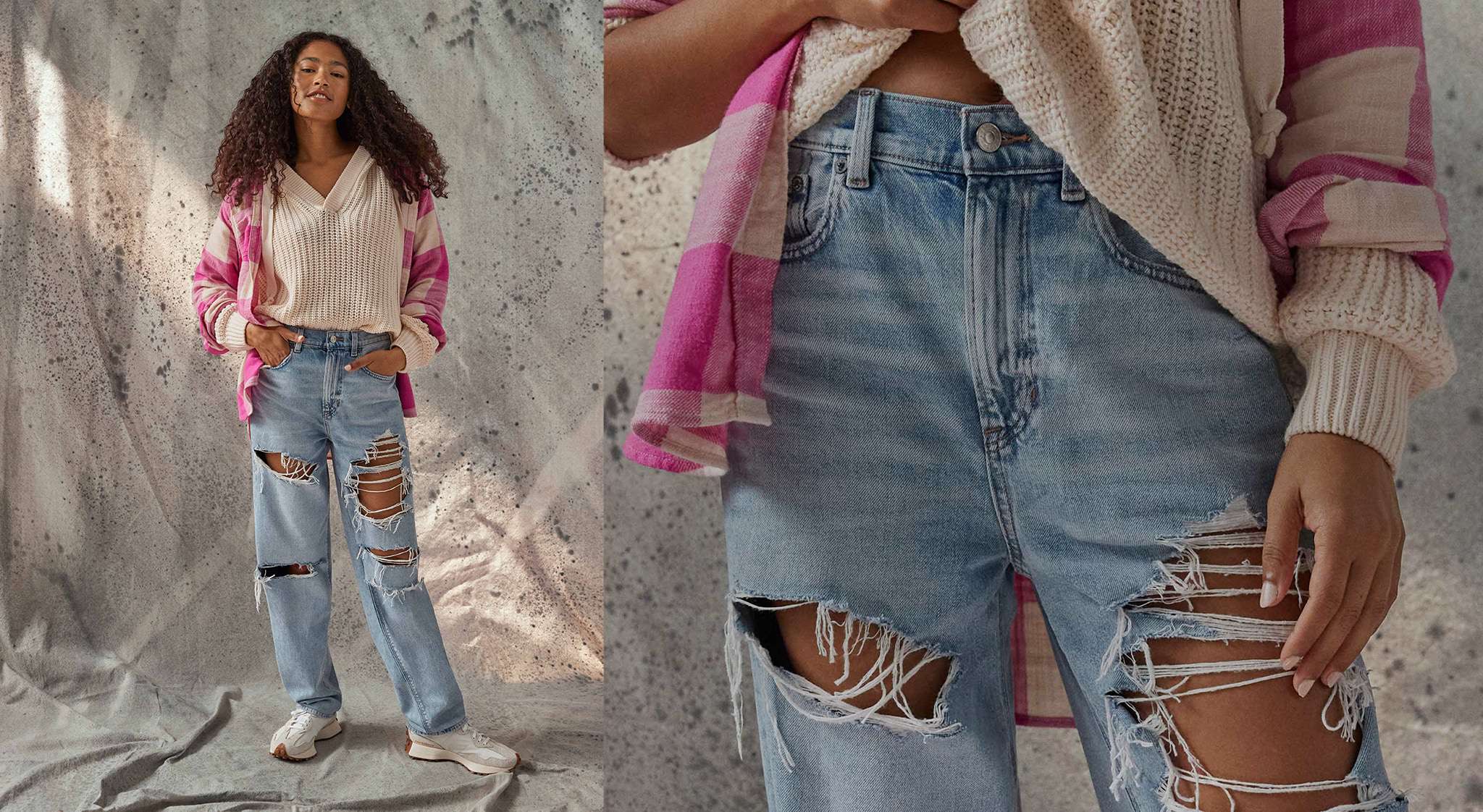 model standing on backdrop wearing baggy ripped jeans