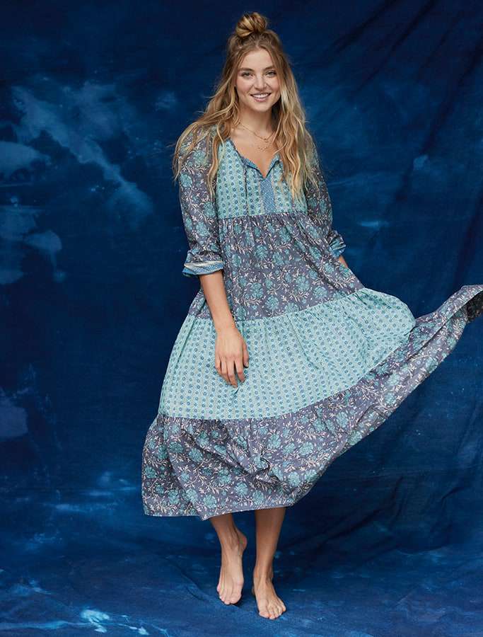 modle in blue maxi dress with different patterns