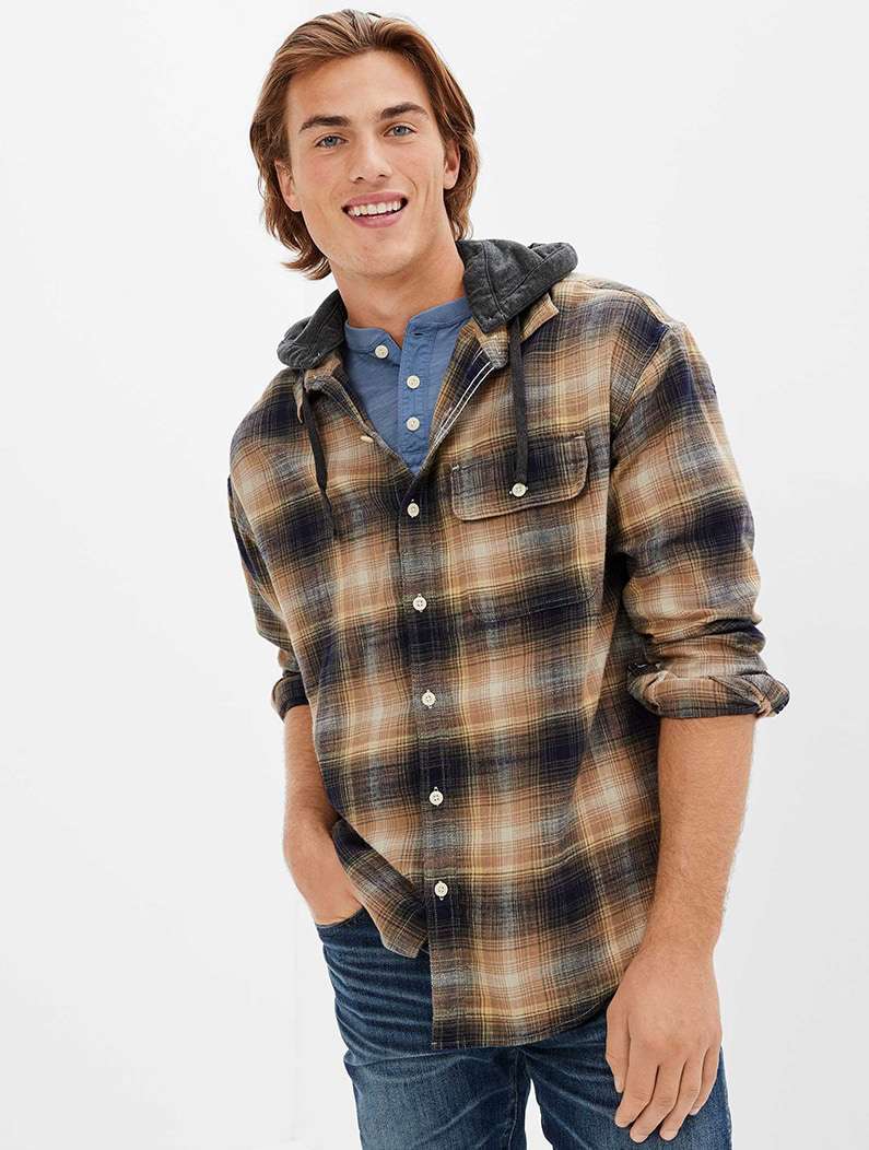 model in brown and gold plaid button up hoodie