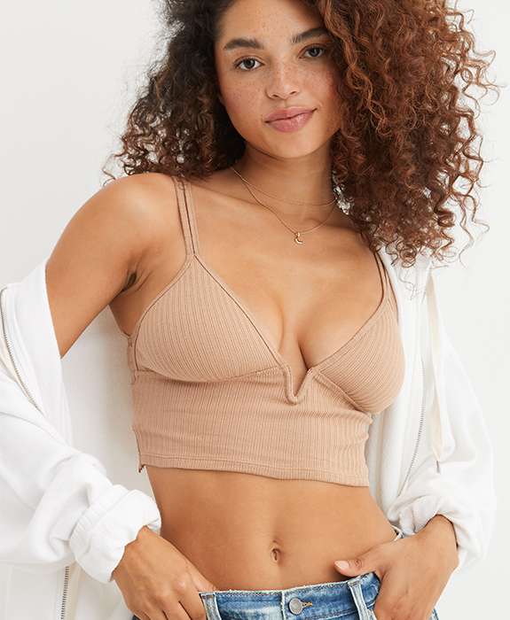 model wearing tan bra top