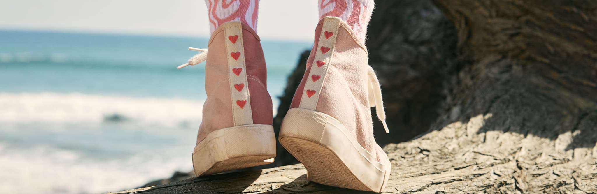 pink shoes with hearts on t