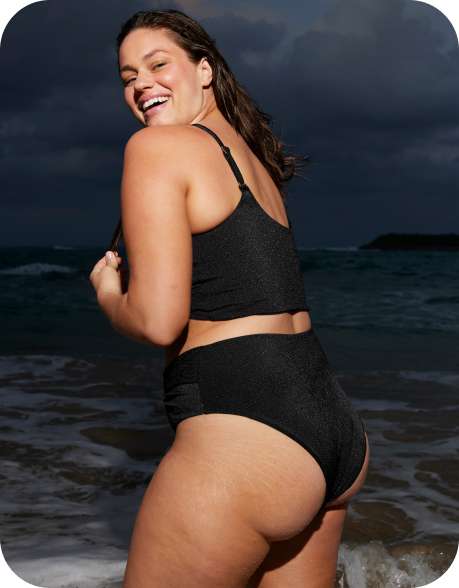 model in black swimsuit