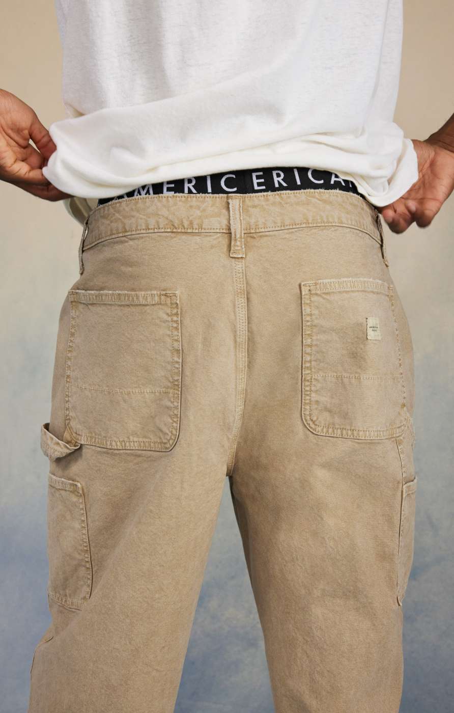 Model in carpenter pants