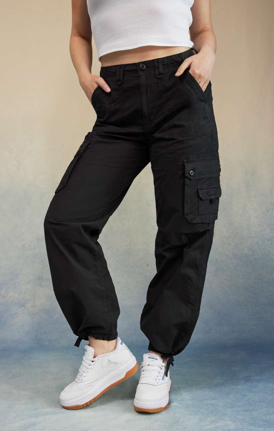 Model in black jogger pants