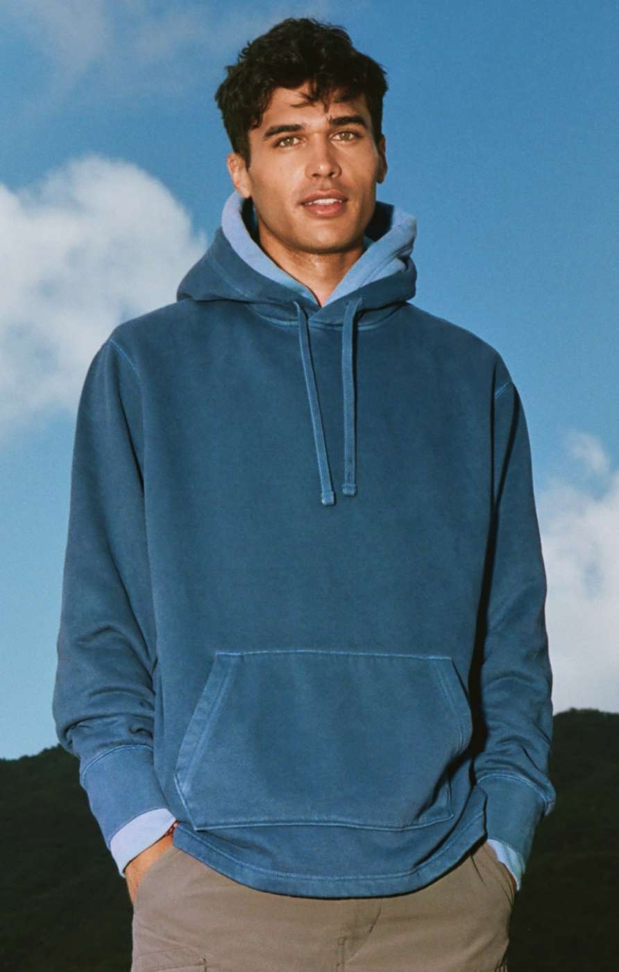 Model in blue AE hoodie
