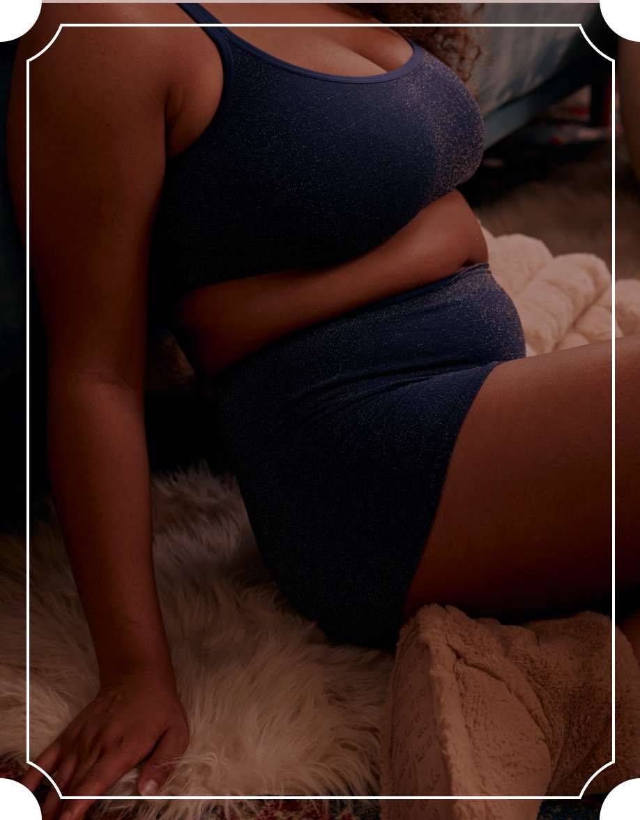 Model in blue matching bra and undie set
