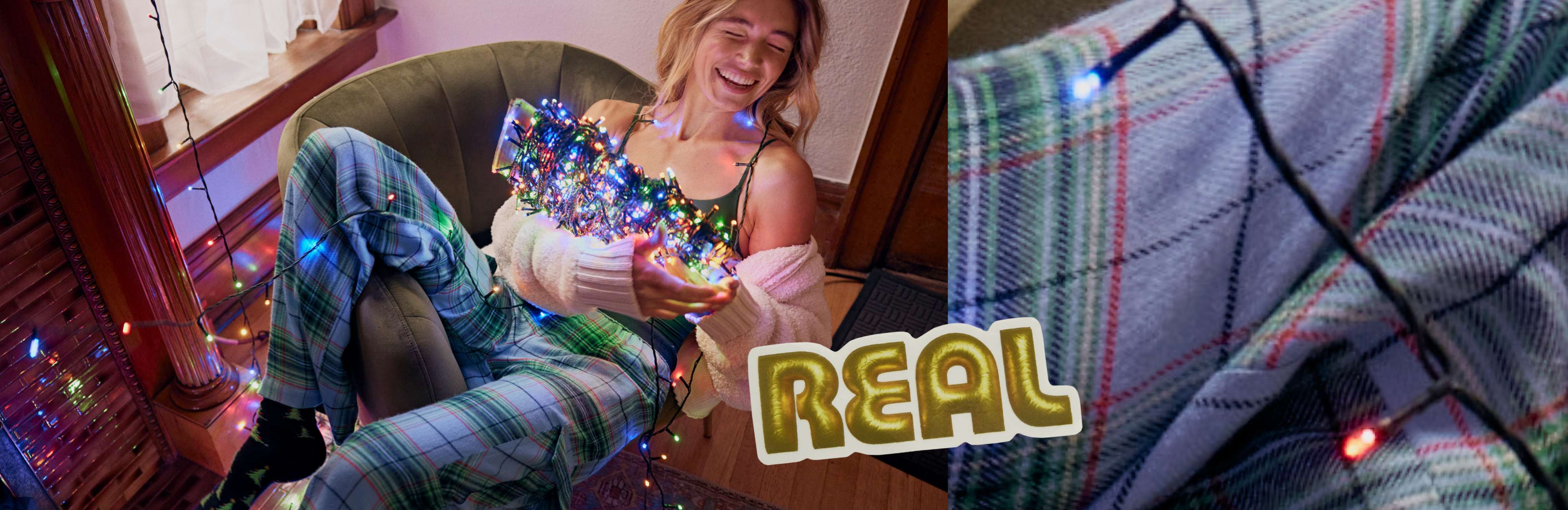 model in pajamas with christmas lights