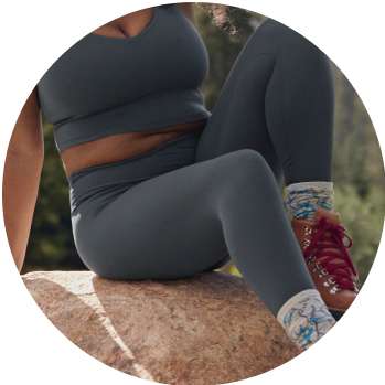 model in grey active legging and sports bra set
