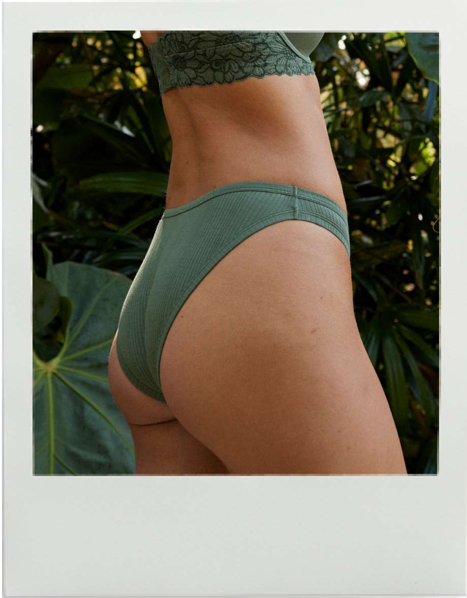 Model in green matching bra and undie set