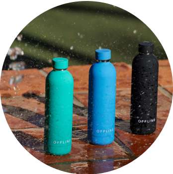 Three water bottles in teal, blue and black