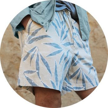 cropped image of mens printed blue and white shorts