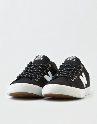 new balance 210 black skate trainers