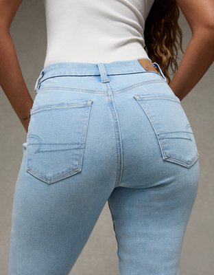 Jean à jambe évasée taille très haute déchiré en rondeur Next Level AE