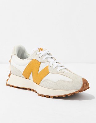 New Balance 327 sneakers in off white with yellow detail