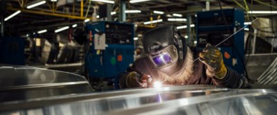 Lowe Boats Metalworker Working on Hull of Boat