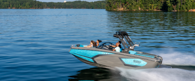 Gray and blue Heyday boat running along the water