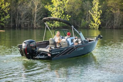 Couple fishing aboard a Lowe Fish and Ski 1800.