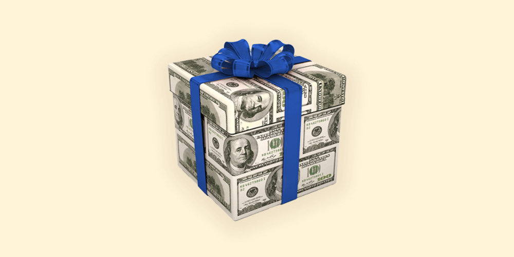 Money covered giftbox wrapped in a blue blow