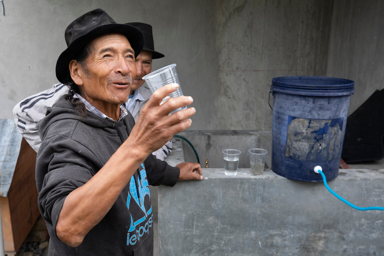 Jose tries some filtered water.