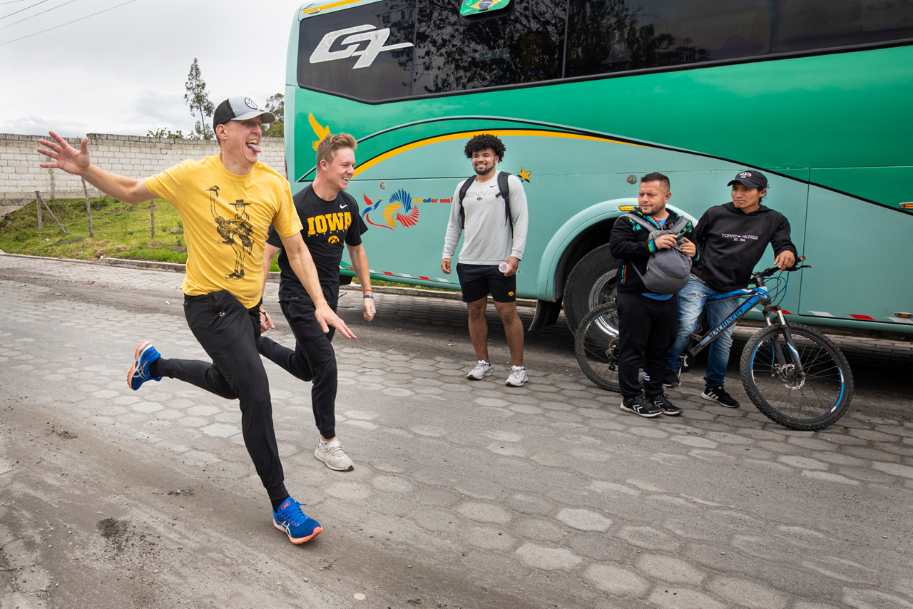The Athletes in Action staff Tim Spark and Benton Weinberg are having a footrace at the end of the day. Benton played for the Hawkeye's golf team. 