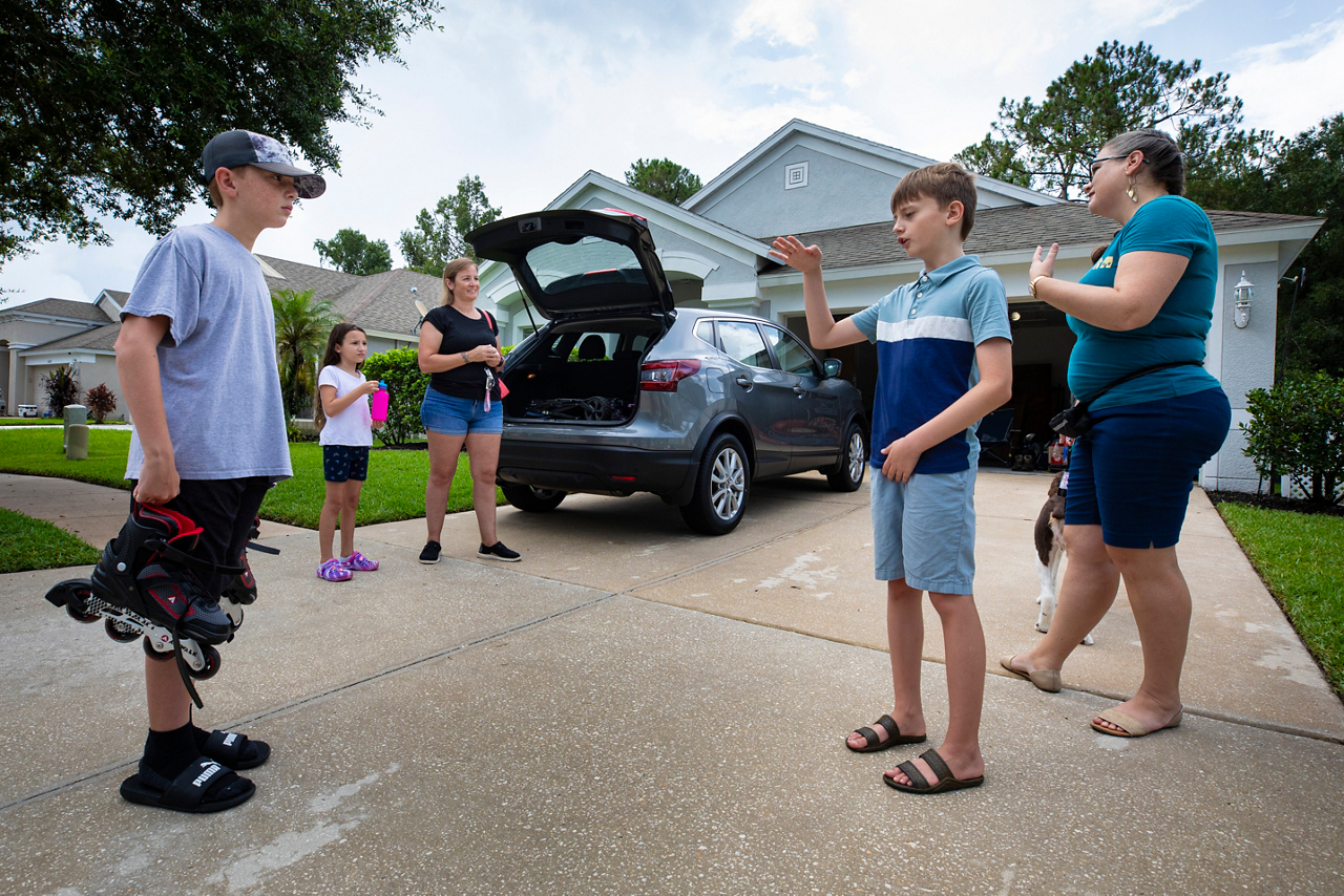 Met a family packing up the car to go skating. Emily Vanyur is the mom, Wyatt, and Zoey the kids. They seemed pretty good friends, as well as the boys. 